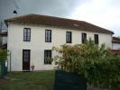 Stone built house with 4 bedrooms, garden and garage, cheap property.